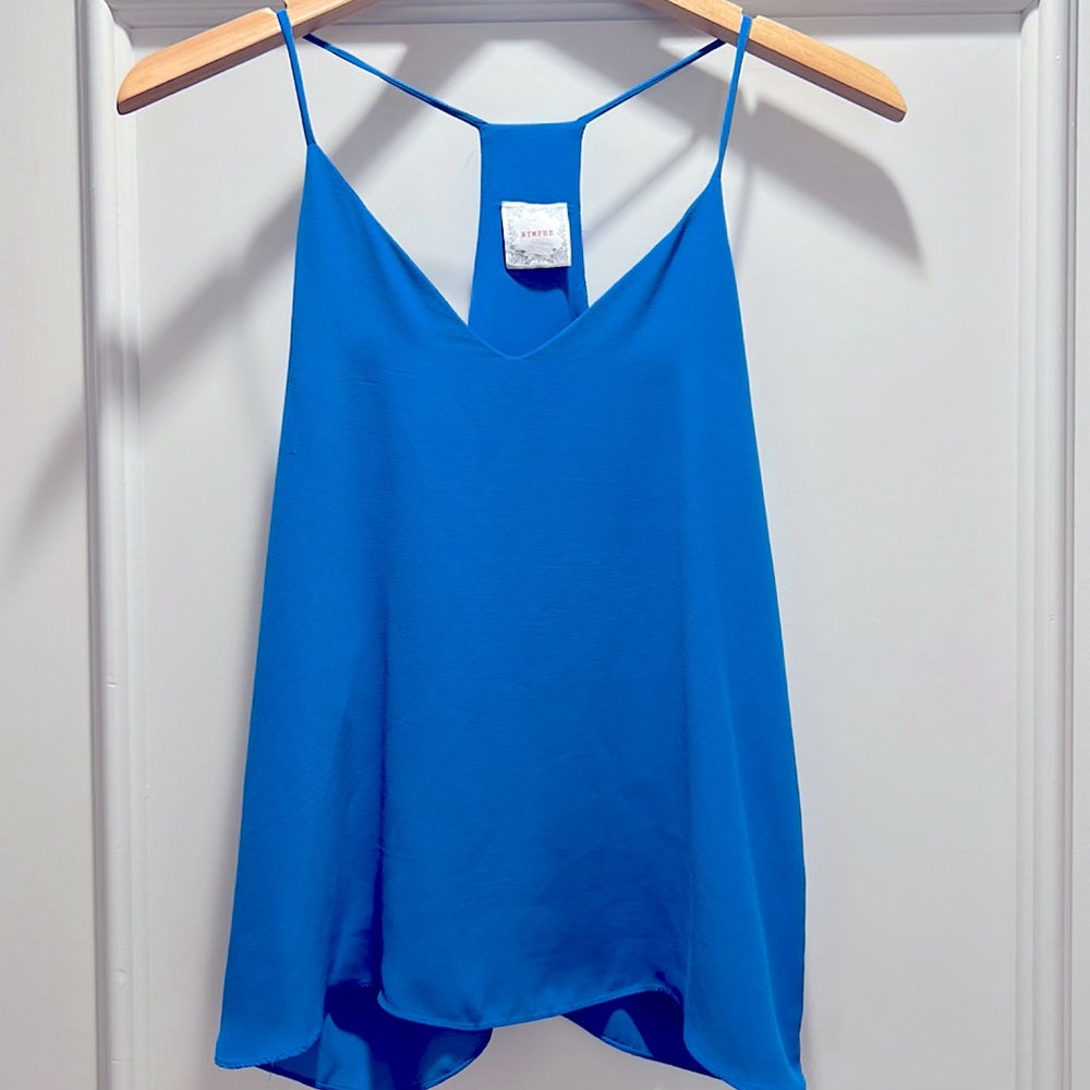 Perfect ageless summer blue silk top.